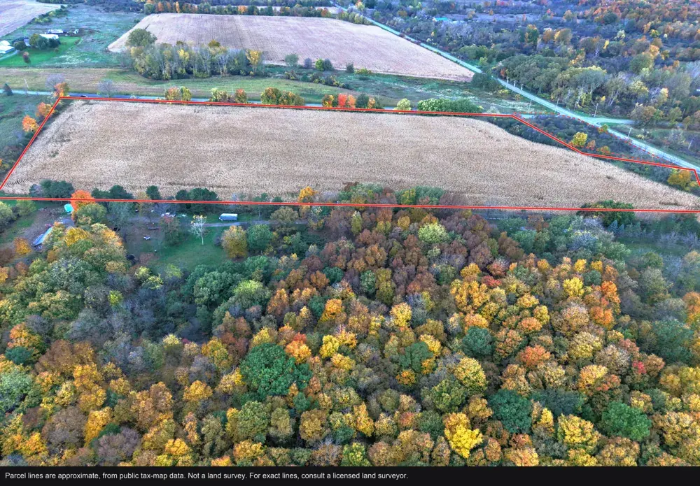 Drone photo of an 18-acre farm field in Rush, New York, with approximate parcel lines drawn in red